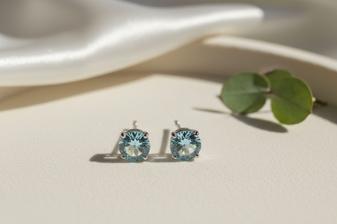 Elegant stud earrings featuring sparkling aquamarine earring stones, perfect for ethical jewelry design inspiration